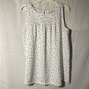 Ann Taylor LOFT Sleeveless Blouse. Pleated round neck. Cream and floral. Medium